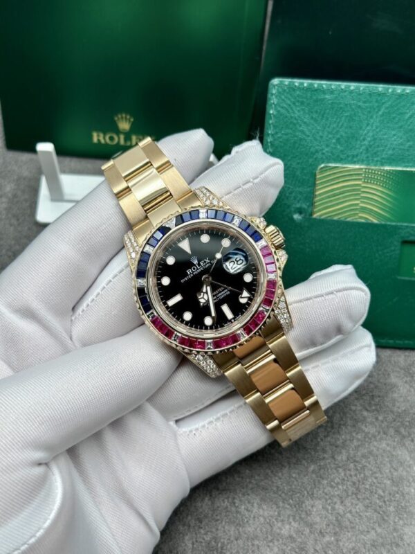 Rolex GMT Master 2 18k Yellow Gold Blue Sapphire And Ruby Bezel Black Dial