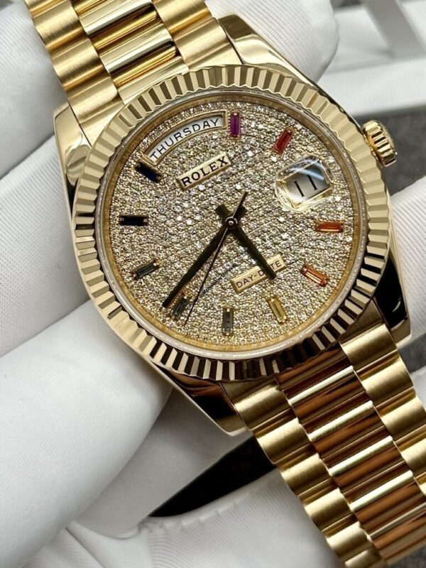 Rolex Day-Date 36 Yellow Gold Diamond Paved Rainbow Colored Sapphires Dial & Fluted Bezel